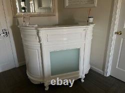 White storage cabinet. Reception desk and other furnitures
